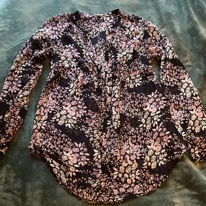 Womens button up blouse.  Yes it’s see thru